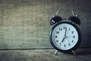 how much to tip movers - a black clock showing 8 o`clock