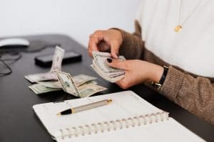 a person counting money