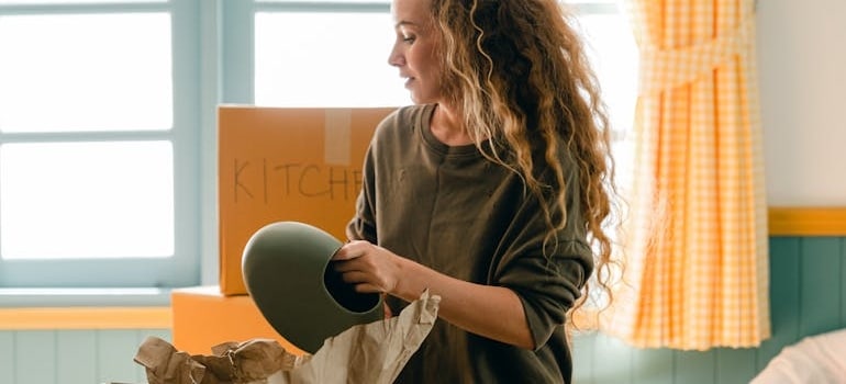 A woman unpacking essentials.